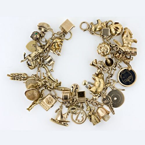 40 Miniature Charms Depicting - a Kettle Drum a Spinning Fan a Menagerie of Animals and More.