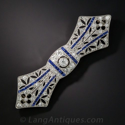 French Platinum, Diamond and Sapphire Brooch with Millegrain Detail.